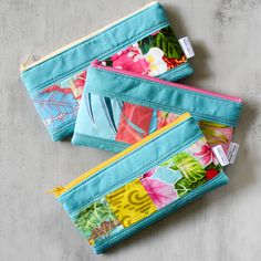 Keep your writing utensils organized in style with our Medium Aqua Taro Patchwork Pencil Cases. The slim zippered pouch features a playful patchwork accent in vibrant colors. Perfect for adding a fun touch to your everyday routine! This listing is updated regularly with available pencil cases. Shown pencil case is a sample only. Patchwork print pattern will be the same, zipper colors may vary. No two pencil cases are the same. Product Details Cotton, linen cotton 8" wide x 4" tall Interfaced for Multicolor Pencil Case With Zipper Closure, Multicolor Zipper Pouch Pencil Case For Organization, Multicolor Pencil Case With Zipper Closure For Organization, Travel Pencil Case Multicolor Rectangular, Multicolor Pencil-shaped Pencil Case For Organization, Multicolor Zipper Pouch Stationery, Multicolor Pencil Case With Pen Slots, Everyday Multicolor Rectangular Pencil Case, Multicolor Stationery Pouch For Daily Use