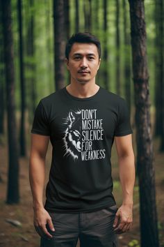 Make a powerful statement with our 'Don't Mistake Silence for Weakness' T-shirt, featuring a striking black and white wolf design. This bold graphic tee embodies the spirit of resilience and untold strength, perfect for those who value the power of quiet confidence. Crafted for comfort and style, it's a versatile addition to any wardrobe, ready to express a message of inner fortitude without saying a word. .: Made with 100% ring-spun cotton, a lightweight fabric (4.5 oz/yd² (153 g/m this unisex t-shirt feels like a bliss to wear all year round.  .: The classic fit with the crew neckline deliver a clean, versatile style that can match any occasion, whether it's formal or semi-formal.  .: All shirts feature a pearlized, tear-away label for total wearing comfort.  .: Made using ethically grow Moon Wolf Tshirt, Wolf Tee Shirt, Quiet Confidence, Cheap Short Sleeve T-shirt With Wolf Design, Statement Tshirt, Wolf Design, Graphic Tees, Gender Neutral, Bathing Beauties