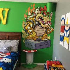 a child's bedroom decorated in green and blue with an image of cartoon characters on the wall