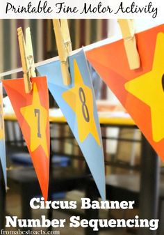 some paper pennants are hanging from clothes pins with numbers on them and the words, printable fine motor activity circus banner number sequence