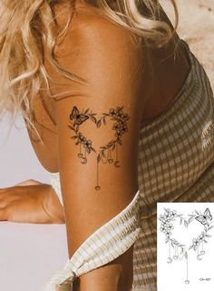 a woman with a tattoo on her arm and behind her is an image of flowers