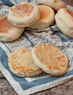 some biscuits are sitting on a blue and white towel