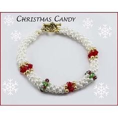 a christmas candy bracelet with red and green beaded beads on white pearls, surrounded by snowflakes