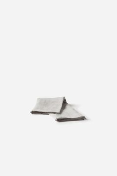 two napkins sitting on top of each other