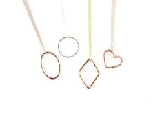 Discover our Simple Shape Necklaces, a delightful addition to our beloved simple shapes series! Crafted by our skilled artisans and made to order, these necklaces feature our iconic 16GA circle, oval, diamond, and heart shapes gracefully threaded onto our barely there 1.1mm chain, creating perfect accessories for any occasion. Available in three fine metal options – 14 karat yellow gold filled, 14 karat rose gold filled, and 100% recycled Sterling silver – each piece is meticulously handcrafted, Rose Gold Oval Link Necklaces As Gift, Rose Gold Oval Link Necklace Gift, Rose Gold Oval Link Necklace, Modern Oval Jewelry With Delicate Chain, Modern Oval Delicate Chain Jewelry, Minimalist Oval Pendant Charm Necklace For Anniversary, Delicate Oval Link Necklace For Gift, Modern Oval Necklace For Everyday, Minimalist Oval Rose Gold Necklace