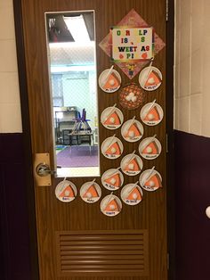 a door decorated with orange and white decorations