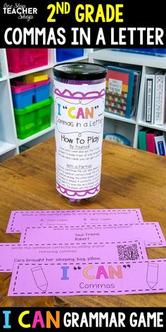 a pink paper cup sitting on top of a wooden table