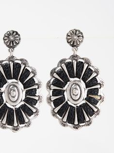 Expertly crafted with a Western-inspired design, these Concho Drop Earrings by Bowie are a sophisticated and versatile addition to any jewelry collection. Adorned with intricate wrapped details, they provide a polished touch to any outfit. Elevate your style with these unique earrings. SizeHEIGHT: 2"WIDTH: 1.25" QualityMade with premium materials for quality and endurance Imported E9520 Concho Drop Earrings, Elegant Black Concho Jewelry, Silver Concho Metal Jewelry, Silver Concho Earrings As A Gift, Silver Concho Earrings For Gift, Concho Dangle Earrings For Gift, Decorative Silver Earrings As Gift, Silver Concho Drop Earrings, Elegant Concho Earrings For Gift