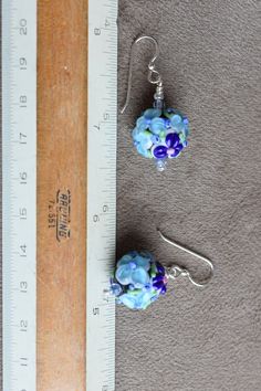 Raised Blue Flowers Lampwork Earrings, Blue Raised Floral Lampwork Bead Earrings, Blue Flowers for Your Ears Sterling Earwires - Etsy Blue Wire Wrapped Beaded Earrings, Blue Wire Wrapped Round Bead Earrings, Blue Wire Wrapped Round Beaded Earrings, Blue Round Wire Wrapped Beaded Earrings, Blue Flower Earrings For Jewelry Making, Blue Wire-wrapped Round Earrings, Adjustable Blue Flower Earrings With Czech Glass, Blue Wire-wrapped Glass Earrings, Blue Czech Glass Beaded Earrings Wire Wrapped