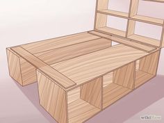 a wooden bed frame with drawers on each side