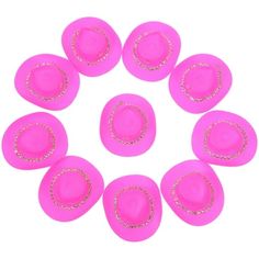 six pink plastic discs with gold trims on the top and bottom, arranged in a circle