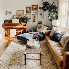 a living room filled with furniture and a piano