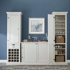 a white cabinet with wine glasses on it