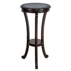 a wooden table with black marble top