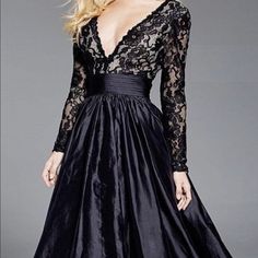 A Beautiful Ball Gown With Lace Bodice And Sleeves. Worn For Talent Performances. Black A-line Ball Gown For Formal Events, Elegant V-neck Gown With Lace Sleeves, Black V-neck Evening Dress, Fitted Bodice Long Sleeve Ball Gown For Evening, Black A-line Ball Gown For Formal Occasions, Evening A-line Dress With Lace Sleeves, Elegant V-neck Ball Gown For Gala, Fitted Black Satin Ball Gown, Black Fitted Satin Ball Gown