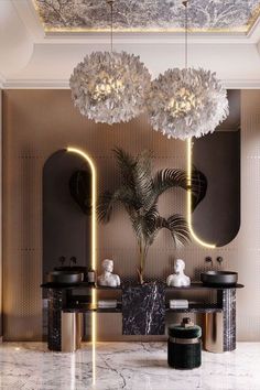 an elegant bathroom with two sinks, mirrors and chandelier in the middle of it