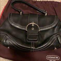 This Is A Vintage Coach, Top Handle Bag. The Leather Is In Amazing Condition And The Fabric Inside Is Also In Great Condition. Perfect Little Bag To Carry Around. Elegant Handheld Satchel With Branded Hardware, Formal Handheld Satchel With Silver-tone Hardware, Formal Handheld Shoulder Bag With Branded Hardware, Classic Clutch Bag With Silver-tone Hardware, Formal Handheld Shoulder Bag With Silver-tone Hardware, Elegant Handheld Satchel With Silver-tone Hardware, Black Shoulder Bag With Silver-tone Hardware For Formal Occasions, Elegant Coach Shoulder Bag With Palladium Hardware, Elegant Coach Bags With Silver-tone Hardware