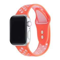 an orange apple watch band with white polka dots