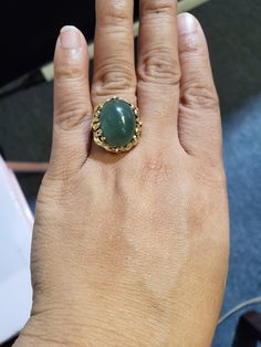 You are viewing a beautiful 14k mings green translucent jade cabochon ring. The total weight of the ring is approx.8.6 grams. The ring size approx.5 3/4 can size up or down. The ring itself measures approx.21mm x 19mm wide. Beautiful green jade translucent cabochon. Send me a message if you have any question. MAKE AN OFFER Yellow Gold Jade Cabochon Ring, 14k Gold Green Gemstone Dome Ring, Green Emerald Oval Cabochon Ring Stamped 14k, Gold Jade Cabochon Rings, Gold Rings With Jade Cabochon, Cabochon Ring, Ring Photos, Jade Pendant, Green Jade