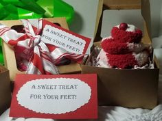 two boxes filled with different types of treats