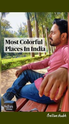 a man sitting on top of a red bench next to palm trees and the words most colorful places in india