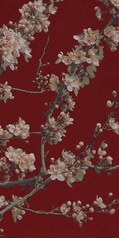 a red background with white flowers and green leaves on the branches, in front of a dark red backdrop