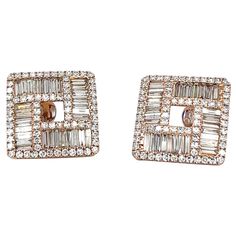 18K Rose Gold Elegant Diamond Earrings 205 Diamonds - 4.66 CT 18K Rose Gold - 7.74 GM These exquisite diamond earrings feature a unique square design crafted in lustrous 18K rose gold. The exceptional quality diamonds are meticulously set, capturing the light with a dazzling brilliance. The clean, geometric silhouette exudes an elegance that is simultaneously modern and timeless. Perfect for elevating any ensemble, these sophisticated rose gold earrings make a refined statement of style. With th Elegant Rectangular Rose Gold Earrings, Luxury Square Earrings For Formal Occasions, Elegant Rose Gold Rectangular Earrings, Luxury Rectangular Brilliant Cut Earrings, Luxury Cubic Zirconia Rectangular Earrings, Luxury Square Cut Earrings For Anniversary, Rose Gold Diamond Earrings With Baguette Diamonds, Luxury Rectangular Cubic Zirconia Diamond Earrings, Luxury Rectangular Diamond Earrings With Accents