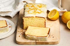 a loaf of lemon pound cake on a cutting board