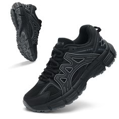 a pair of black running shoes on a white background