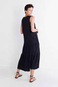 A timeless and feminine staple characterized by delicate pleats, style this dress with heels or flats to dress it up or keep it more casual and relaxed with some sneakers. Sleeveless Pleated design Maxi length Side pockets Oversized fit Casual Relaxed Fit Maxi Dress, Casual Midi Dress For Daywear, Casual Summer Maxi Dress With Pleated Hem, Casual Summer Maxi Dress For Work, Casual Black Pleated Sleeveless Dress, Casual Relaxed Fit Maxi Dress For Work, Relaxed Fit Casual Maxi Dress For Work, Summer Casual Midi Dress With Pleated Hem, Casual Summer Midi Dress With Pleated Hem