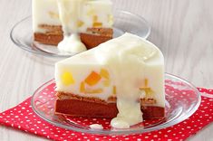 two pieces of cake sitting on top of a glass plate