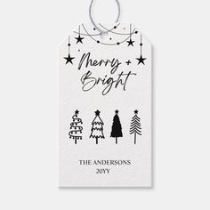 a white christmas gift tag with the words merry bright on it and three different trees