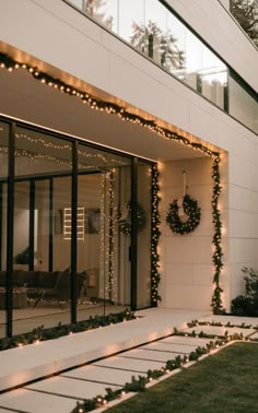 an outside view of a building with christmas lights