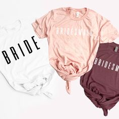 three bridesmaid t - shirts sitting next to each other on a white surface