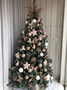 a decorated christmas tree in a room