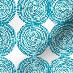 a blue and white wallpaper with circular designs on the back ground, all in different sizes