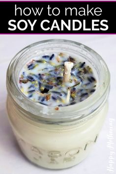 a jar filled with candles sitting on top of a white table next to the words how to make soy candles