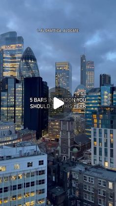 the city skyline is lit up at night, with buildings in the foreground and text that reads 5 bars in london you should visit this year