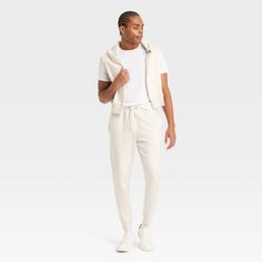 From spending a leisurely weekend to running errands, take on your day in comfy style in these Tapered Fleece Jogger Pants from Goodfellow & Co™. Made from cotton-blend fleece fabric for cozy comfort, these mid-rise tapered joggers feature a drawstring elastic waistband to help you find a secure fit, while the cuffed design offers a snug fit. Plus, they're designed with side and back pockets to carry your essentials as you go about your day. Goodfellow & Co™: Feel good in what you wear, anywhere Tapered Joggers, Cargo Joggers, Fabric Tape, Comfy Fashion, Mens Fleece, Fleece Joggers, Cotton Fleece, Bottom Clothes, Comforters Cozy