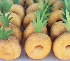 several donuts with pineapples on them are arranged in the shape of doughnut holes