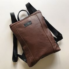 Small Brown Leather Backpack Versatile Brown Leather Backpack, Brown Leather Shoulder Bag For Commuting, Brown Backpack With Adjustable Strap For Commuting, Brown Leather Backpack For Commuting, Brown Satchel Bag For Commuting, Rectangular Brown Bag For Commuting, Brown Soft Leather Backpack For Everyday Use, Small Leather Backpack, Brown Backpack