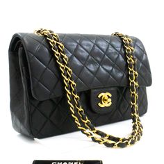 An CHANEL Classic Double Flap 10" Chain Shoulder Bag Black made of black Lambskin k49 This item is Vintage / Classic. The year of manufacture would be 1996-1997.This browser is not supportedConditions & RatingsOutside material: LambskinColor: BlackClosure: Turn LockHardware and chain: Gold-ToneMade in FranceSerial sticker: AttachedSerial #: 4024119 (Same number on the sticker and the card.)Comes with: ity card, Dust bagOutside: 7 of 10 - Nice condition. Small push marks on the front.Inside: 7 of 10 - Nice condition with normal signs of use. Scratches especially on the inner flap. No stickiness or peeling.Strap and Hardware: 8 of 10 - Shiny and excellent condition with minimal signs of use.Dust bag: 8 of 10 - Excellent condition with minimal signs of use.See how big the item is by using ARA Chanel Double Flap, Chanel Jumbo, Chanel 2, Chanel Model, Chanel Vintage, Style Noir, Double Chain, Shoulder Bag Black, Chain Shoulder Bag