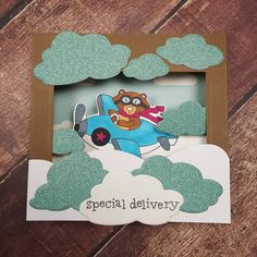 a card with a teddy bear flying in an airplane