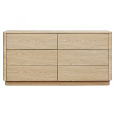 the sideboard is made from wood and has four drawers