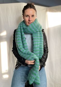 Hand knitted long and bulky scarf made from luxurious mohair silk blend (75% mohair, 25% silk) yarn in two colours: blue and green. It is double layered, very warm, soft and lightweight. Wrapping in it will give you a feeling of cosiness and relaxation. Knitted scarf is very soft and stretchy therefore  the size is approximate but not smaller than indicated: Width of the scarf - 30 cm (11.81 inch) Length 220 cm (86.61 inc) As well please note that this garment is entirely  handmade and it might have slight imperfections or irregularities as it is not a mass production. Every item is unique, none is the same. Ready to ship in 1 -3 business days. Note that colours may look different on your display depending on their settings and technical characteristics. Wish for any other colour combinati Fluffy Shawl, Bulky Scarf, Mohair Scarf, Silk Yarn, Green And Blue, Knit Scarf, Silk Scarf, Scarf Wrap, Color Combinations