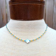 Handmade By Me. Single Strand Glass Seed Beads, Glass Bugle Beads, And A Star Shaped Shell Bead Necklace With A Silver Lobster Clasp Shell Beads Necklace, Bugle Beads, Glass Seed Beads, Shell Beads, Pretty Jewellery, Strand Necklace, Star Shape, Bead Necklace, Blue Gold