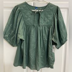 Nwt Super-Cute, Green Blouse With Quilted Neckline. Perfect Color For Fall! Short Sleeve Cotton Blouse With Bow, Spring Short Sleeve Blouse With Bow, Casual Puff Sleeve Tops With Bow, Casual Short Sleeve Blouse With Tie Sleeves, Summer Blouse With Bow And Short Sleeves, Casual Blouse With Tie Sleeves, Cotton Puff Sleeve Top For Brunch, Casual Spring Tops With Bow Detail, Casual Spring Tops With Bow