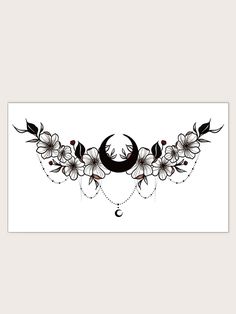 a black and white tattoo design with flowers on the bottom half of it, and a crescent