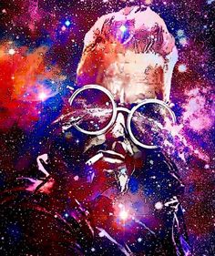 a man with glasses in the middle of space surrounded by stars and dust, as if he's listening to music