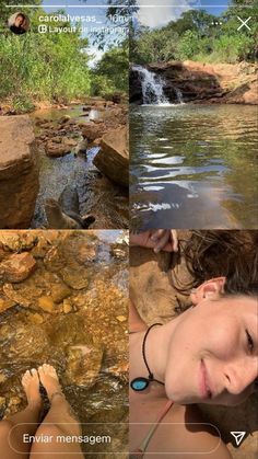 a woman laying on top of a rock next to a river